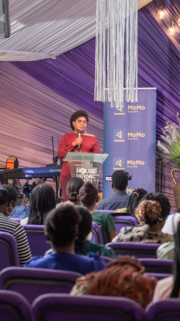 Nicole Tshani speaking on stage at the Women in Business Conference, Kampala, 2026